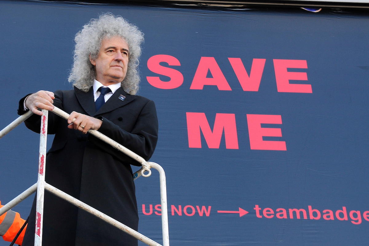 DJBE8R Queen guitarist Brian May launches the Team Badger campaign in London with a giant billboard poster on Cromwell Road, at one of the capital's busiest junctions, to mark the start of a campaign to stop the planned cull of badgers in England with the aim of raising public awareness and collecting signatures on a petition to force a debate in Parliament. London, England - 19.09.12 Cre