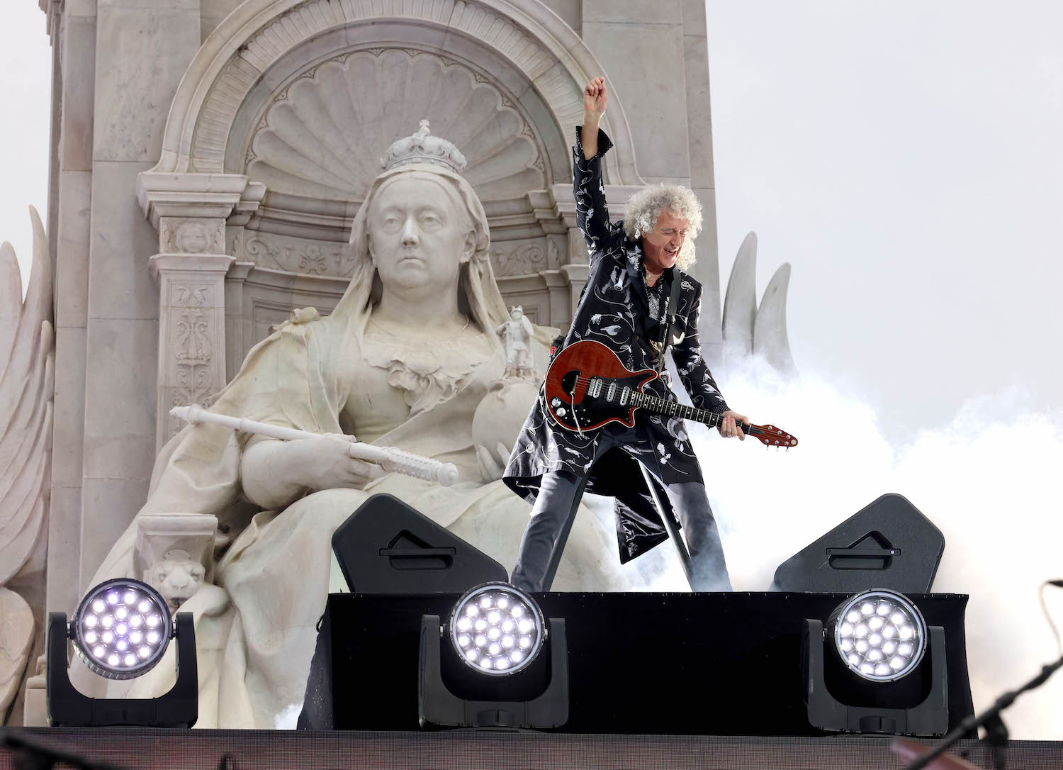 Mandatory Credit: Photo by Jonathan Buckmaster/WPA Pool/Shutterstock (12972831f)
Brian May Queen Perfoming
Platinum Party at the Palace, London, UK - 04 Jun 2022
The celebration will see famous faces from the world of entertainment brought together to perform for a night of musical tributes to celebrate the Jubilee. 22,000 people will attend the event including 10,000 allocated in a public ballot and over 7,500 tickets for key workers, members of the Armed Forces, volunteers, and charities